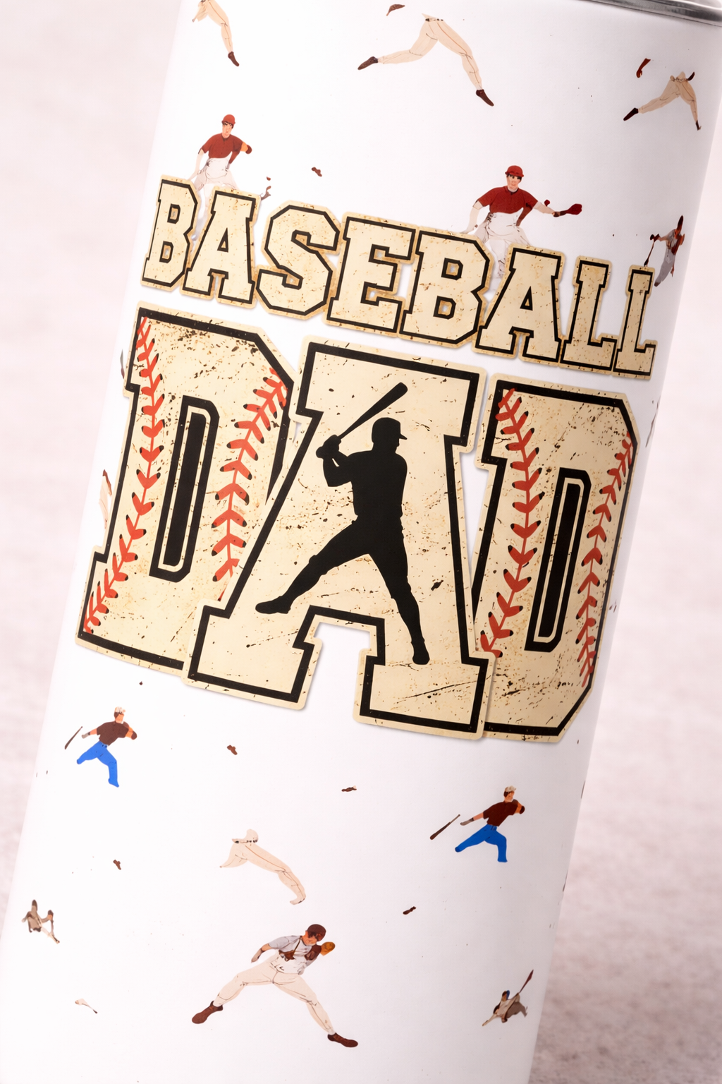 Close up of baseball dad design on 20 oz stainless steel tumbler showing baseball stitching and player silhouette