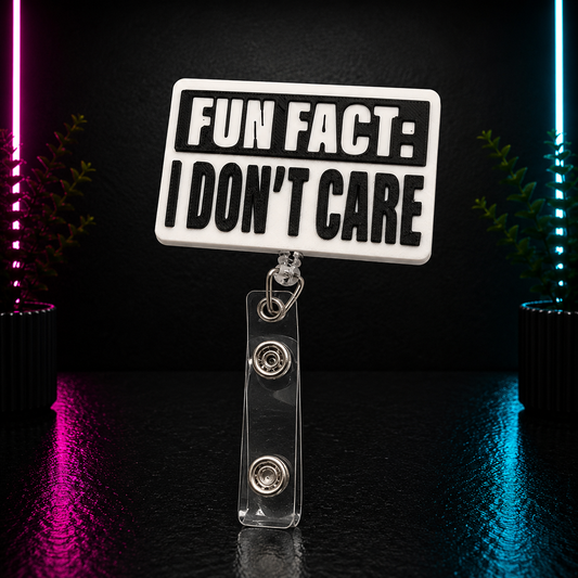 Black and white 3D printed "Fun Fact: I Don't Care" retractable badge reel with bold lettering for nurses, teachers, office staff, and healthcare professionals.