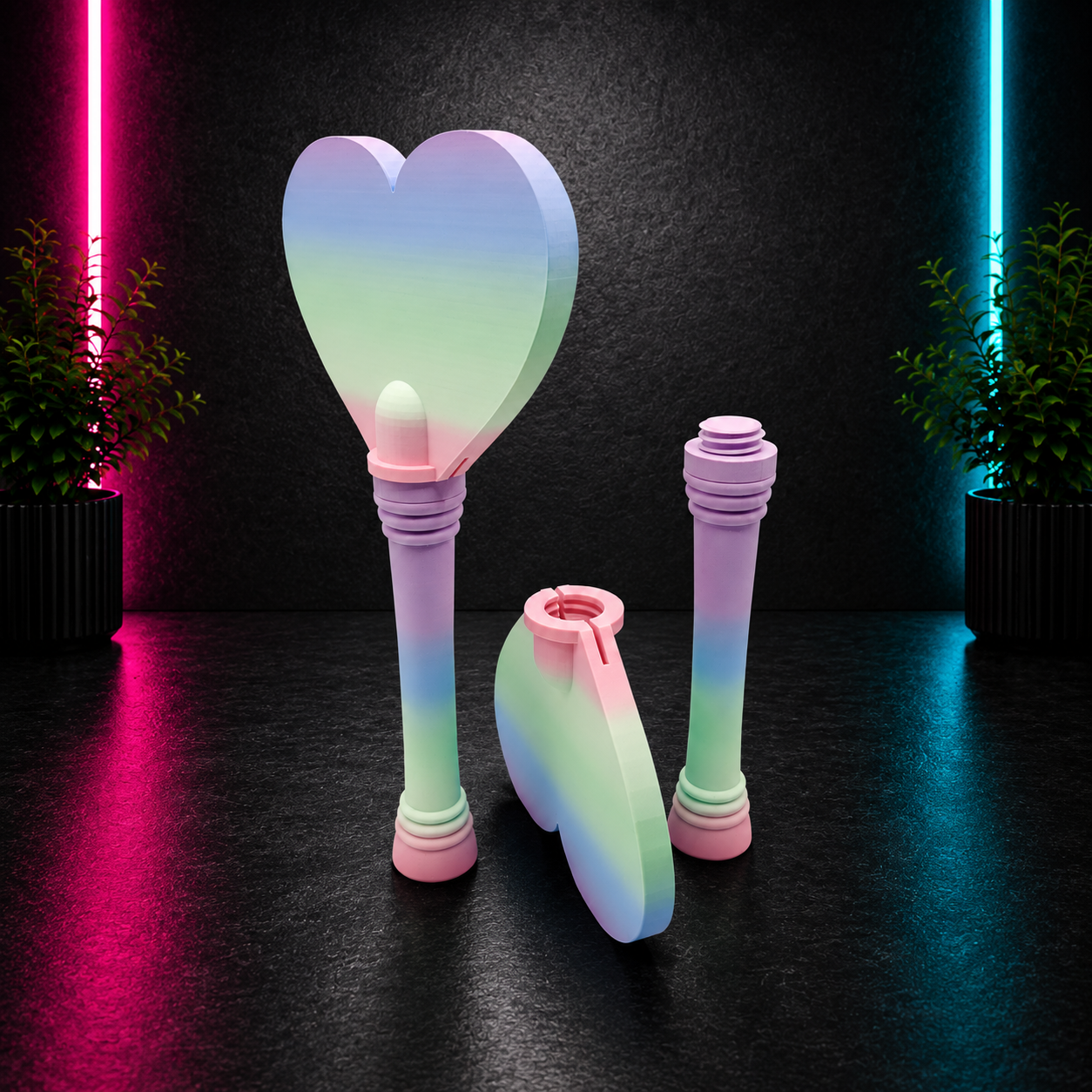 Pastel rainbow heart tap-to-pay wand accessory designed to hold a credit card for contactless payments